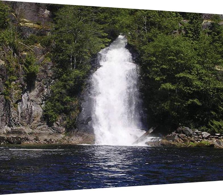 Cascading waterfall at the head of Teakerne Arm in Canada