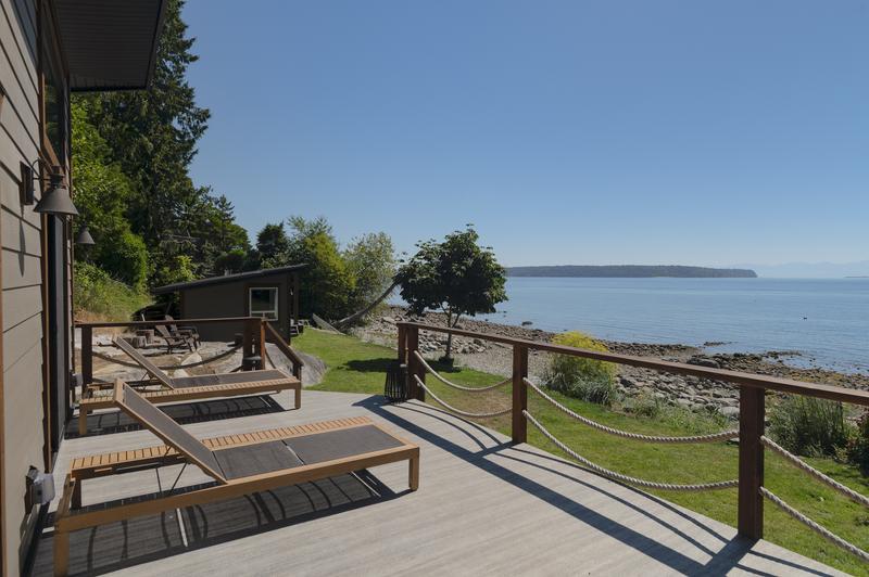 Lounge chairs at a waterfront cabin