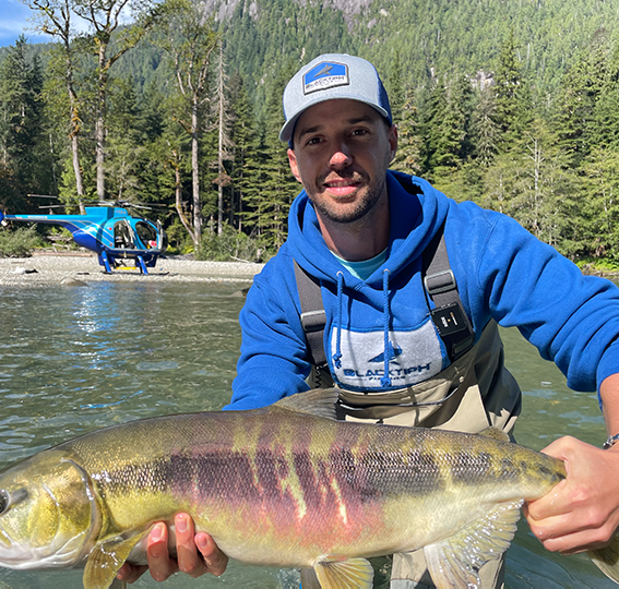 Jake Jorgenson of BlacktipH holding a fish he caught